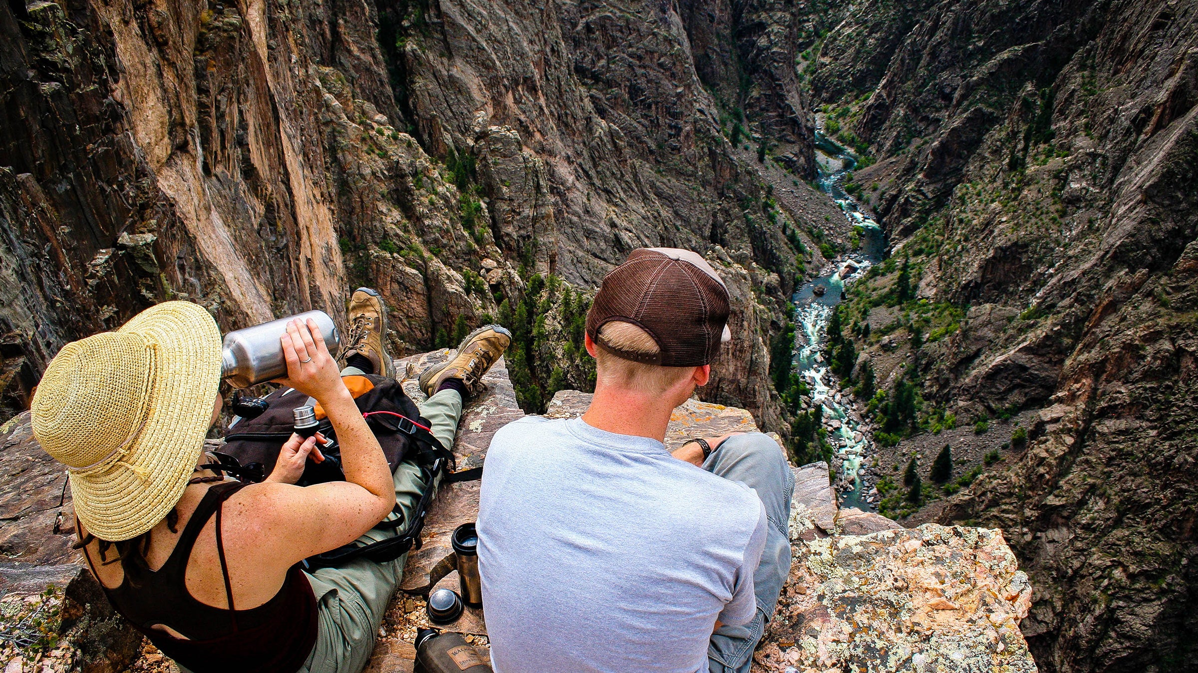 Couple enjoying the view at an overlook in Black Canyon of the Gunnison National Park