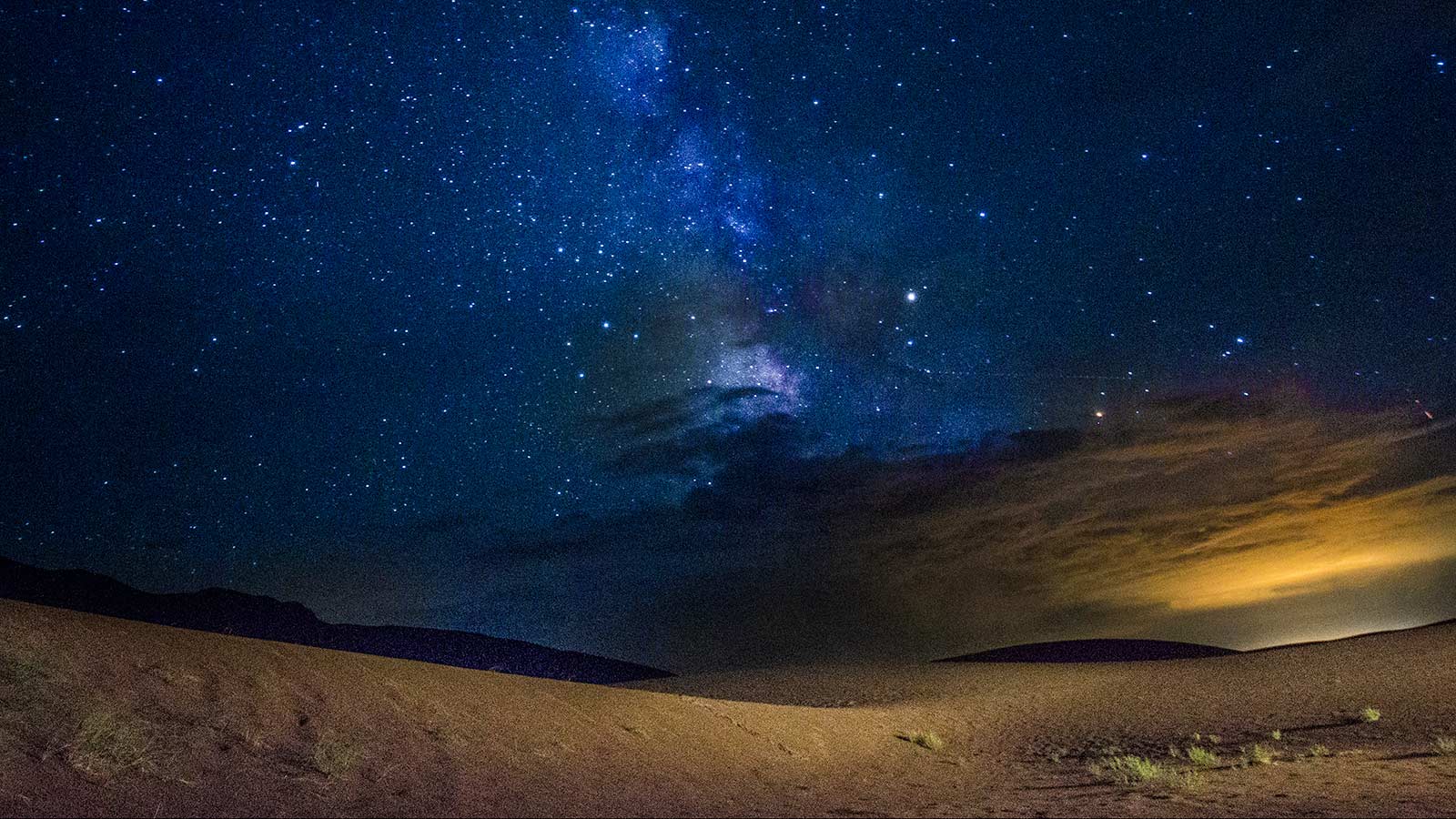 "The Milky Way over sand in Great Sand Dunes National Park"