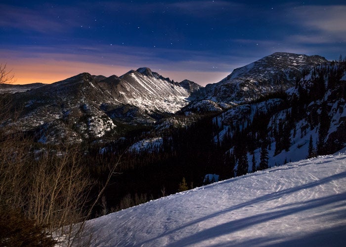 "Winter in Rocky Mountain National Park's Glacier Gorge with Longs Peak in the horizon."