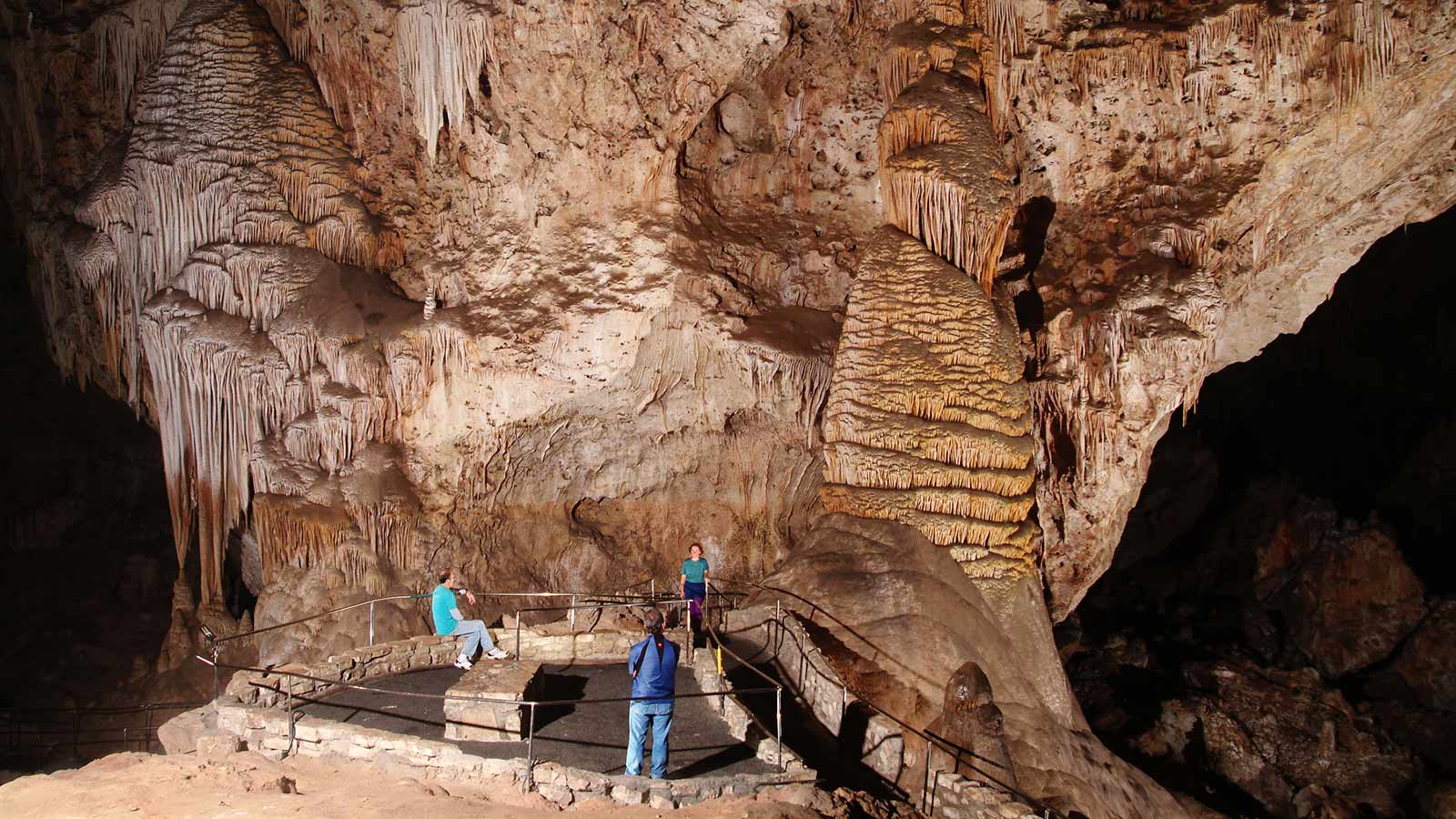Carlsbad Caverns National Park visitors at Rock of Ages viewing area on the Big Room Trail
